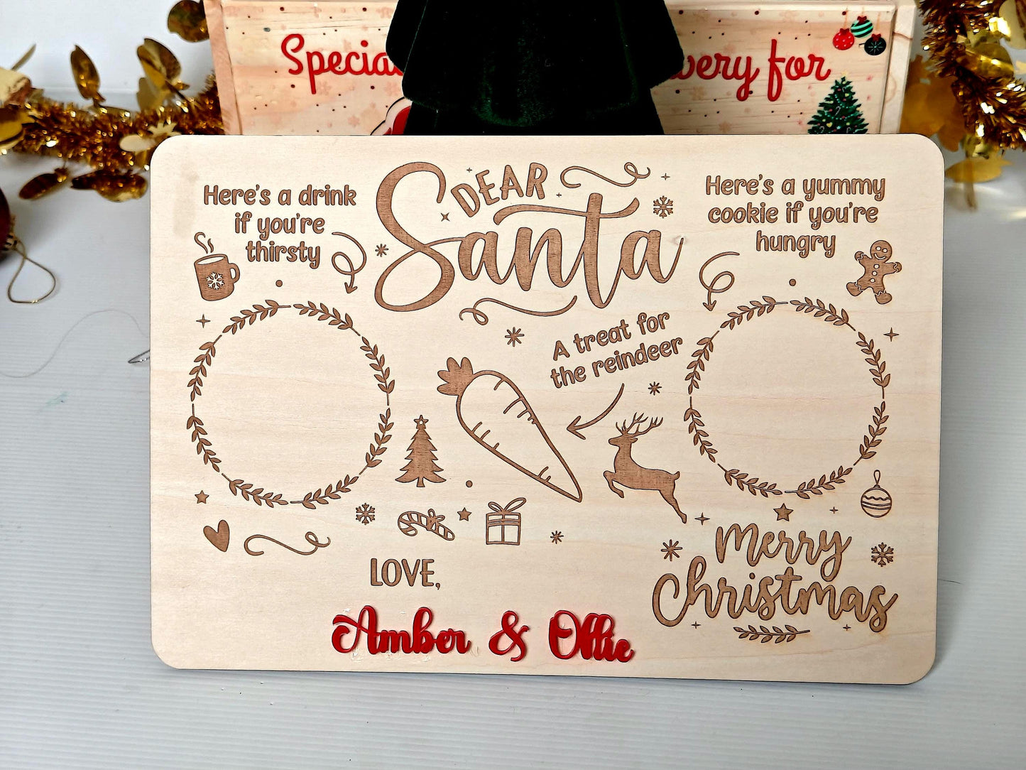 Wooden sign with Christmas-themed text and graphics on a light gray background