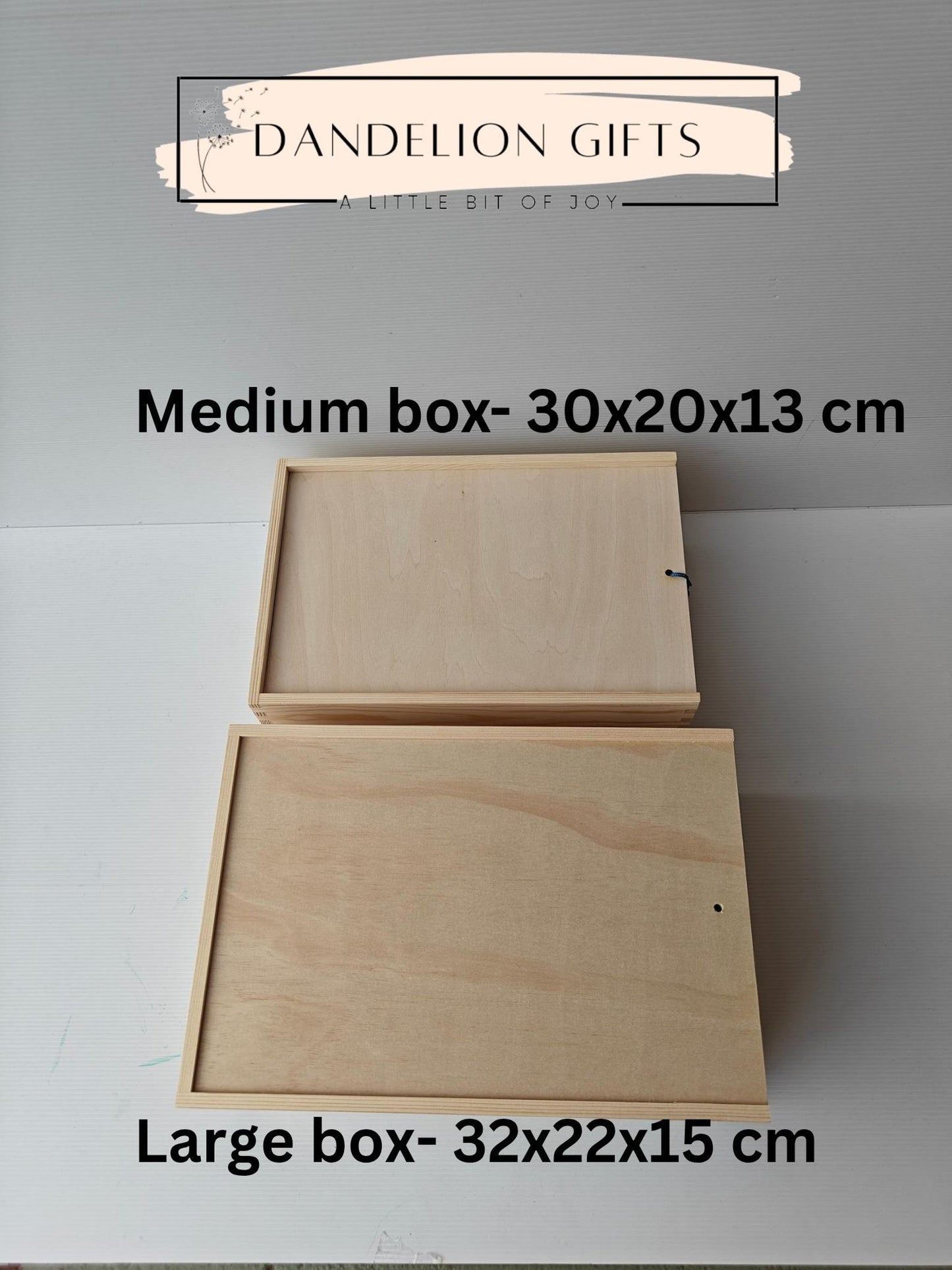 Two wooden boxes with dimensions labeled, branded as 'Dandelion Gifts'.