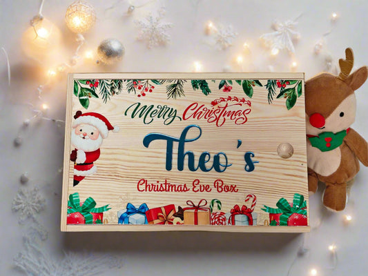 Wooden Christmas Eve box with festive design and 'Theo's Christmas Eve Box' text, surrounded by Christmas decorations.
