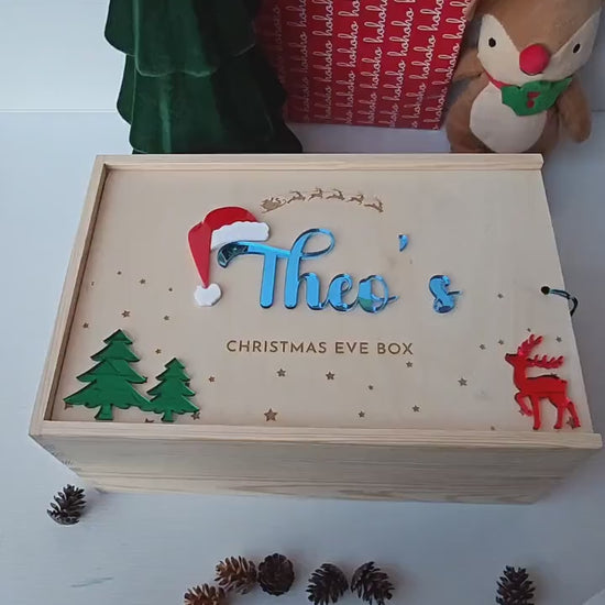 Personalised wooden Christmas Eve box with a name on it.