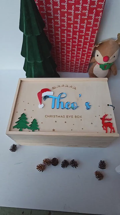Personalised wooden Christmas Eve box with a name on it.