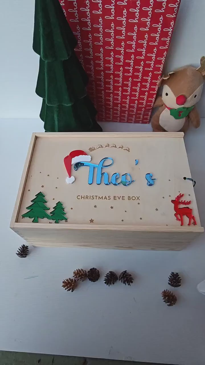 Personalised wooden Christmas Eve box with a name on it.